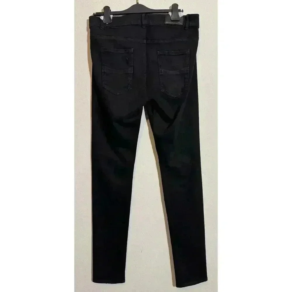 Amiri Leather Patch MX1 Distressed Jeans